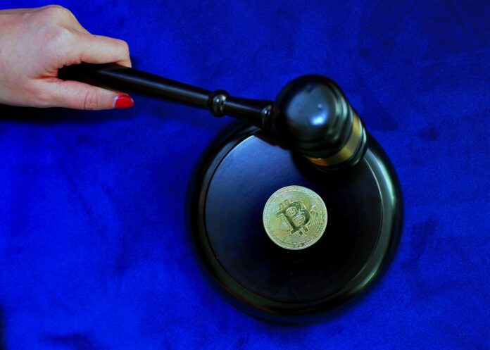 Gavel symbolizing regulatory oversight and legal scrutiny as crypto companies enter public markets through IPOs.
